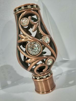 25mmの円形の金属の装飾的なカーテンのロッドエンドはローズの金材料ODMを銅張りにする
